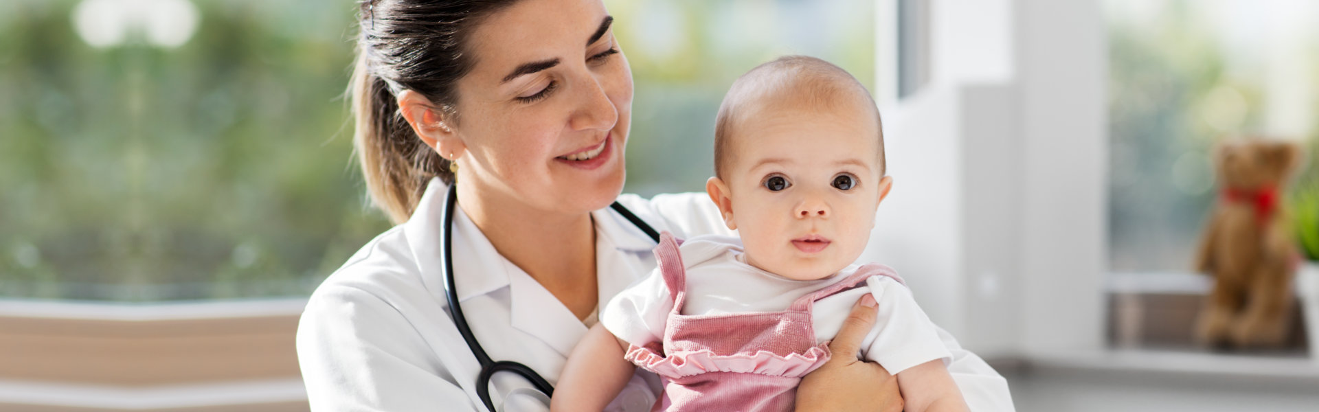 doctor holding the child